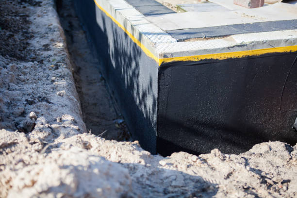 Professional Emergency Waterproofing technician working in Clarksville, MD